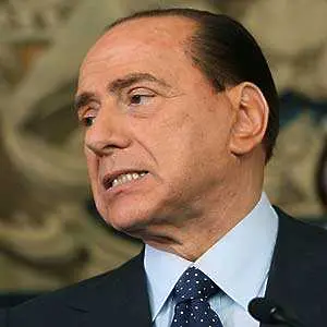 Глобиха Берлускони 560 млн евро