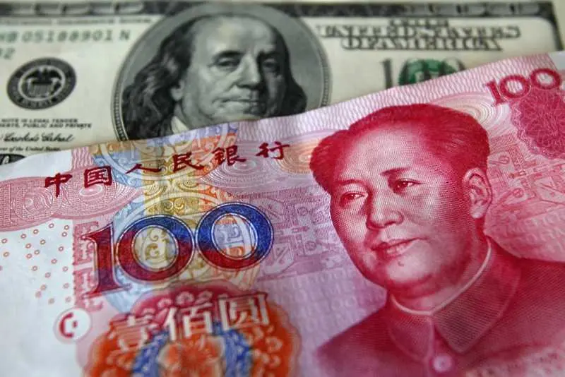Китай обезцени юана, за да стимулира икономиката