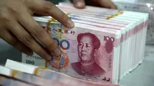 Китай понижи отново националната си валута