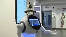 В Белгия роботи мерят температура и проверяват дали хората носят маски