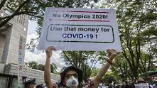 Олимпийският огън посрещнат с протест в Токио