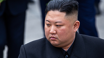 Севернокорейският лидер Ким Чен Ун и министърът на отбраната на