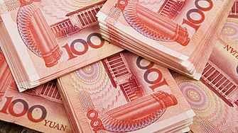 Обменният курс на юана спрямо щатския долар падна днес  под най ниските