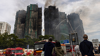 Хонконг арестува блогър за критики към властите след огромния пожар в жилищен комплекс 